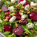 Delicious Roasted Beet Goat Cheese Arugula Salad food shot
