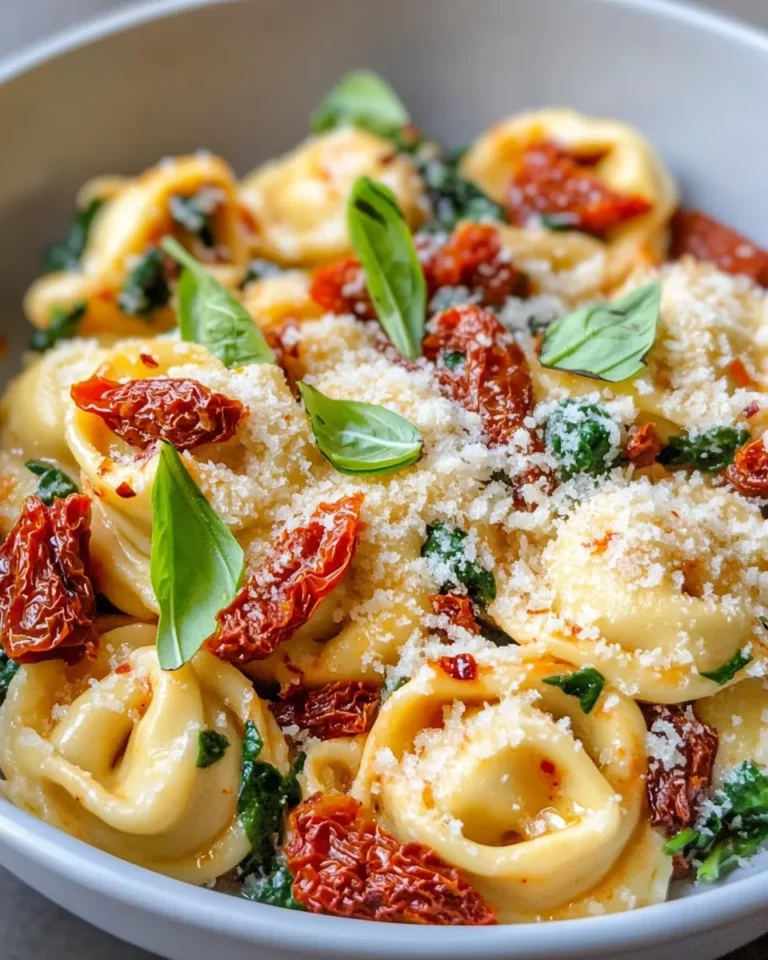 Homemade Creamy Sun-Dried Tomato Tortellini with Spinach photo