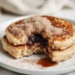 Easy Nutella Stuffed Cinnamon Sugar Donut Pancakes photo