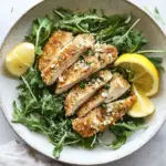Amazing Crispy Baked Parmesan Chicken with Lemon Arugula. food shot