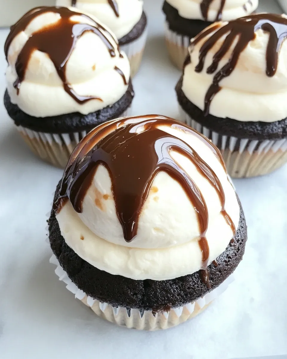 Easy Fugdy Brownie Stuffed Banana Cupcakes with Toasted Marshmallow Frosting recipe photo