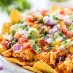 Easy Loaded Chicken Enchilada Nachos photo