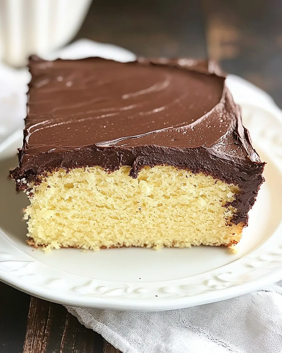 Homemade One Layer Yellow Cake with Chocolate Frosting photo