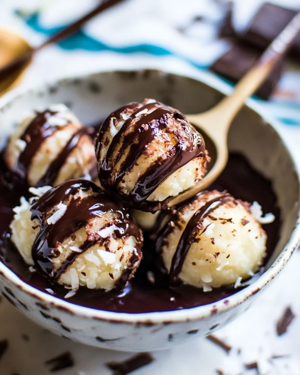 Ultimate Sweet Cuban Coconut Balls with Melted Chocolate (Coquito Acaramelado). food shot