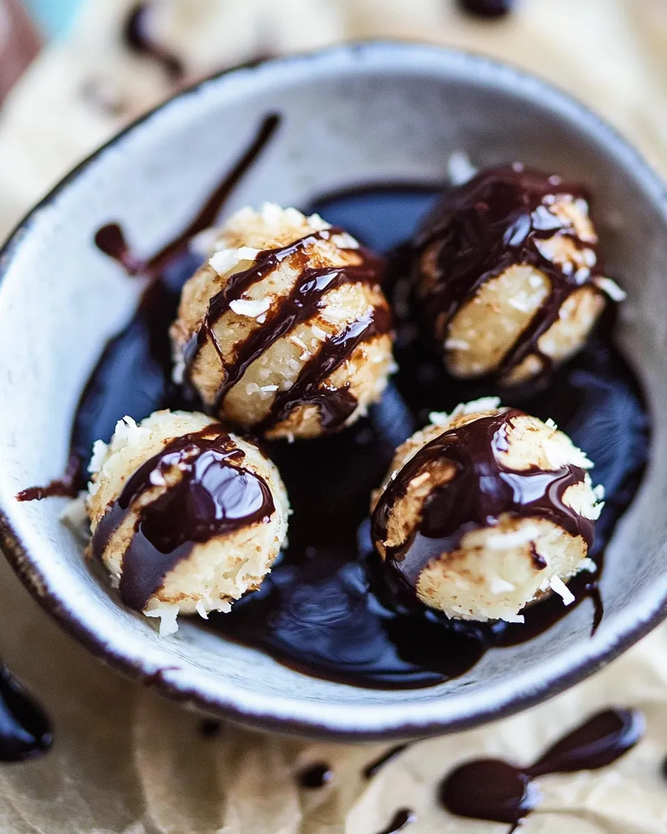 Savory Sweet Cuban Coconut Balls with Melted Chocolate (Coquito Acaramelado). food shot