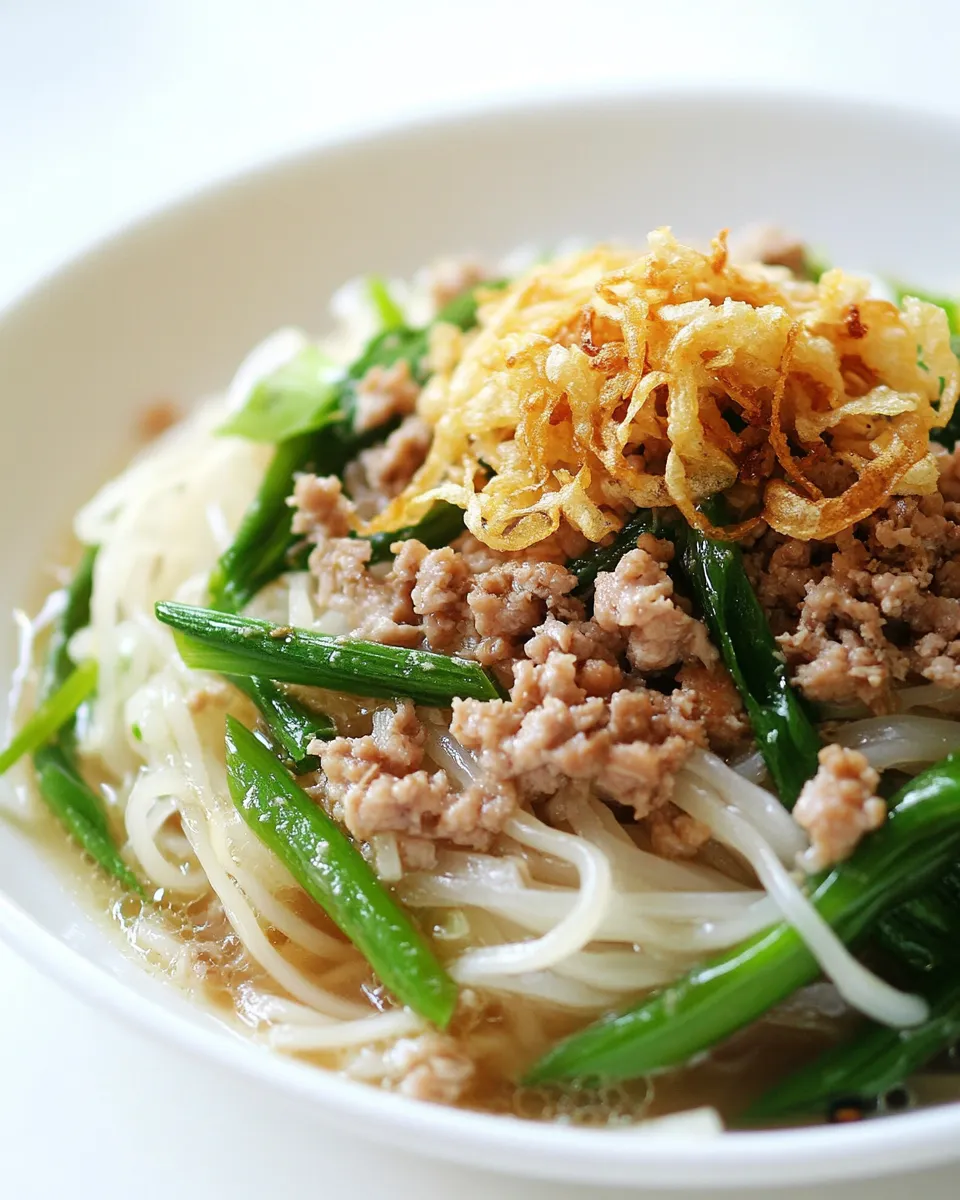 Delicious Thai Noodles with Ground Chicken and Crispy Shallots dish photo