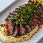 Homemade Thinly Sliced Ribeye with Hummus and Capers photo