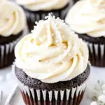 Homemade Vanilla Buttercream Topped Cocoa Cupcakes photo
