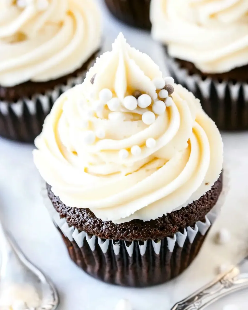 Easy Vanilla Buttercream Topped Cocoa Cupcakes shot
