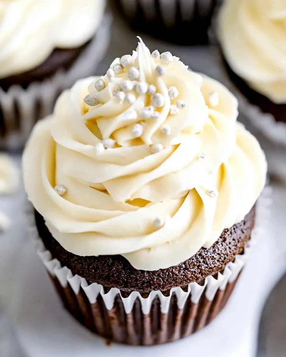 Delicious Vanilla Buttercream Topped Cocoa Cupcakes recipe photo