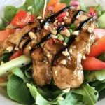 Homemade Balsamic Marinated Chicken Over Salad photo