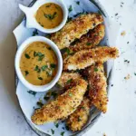 homemade Baked Black Pepper Ranch Chicken Fingers with Honey Mustard. photo