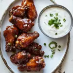 homemade Baked Boneless Honey BBQ Chicken Wings with Spicy Ranch. recipe photo