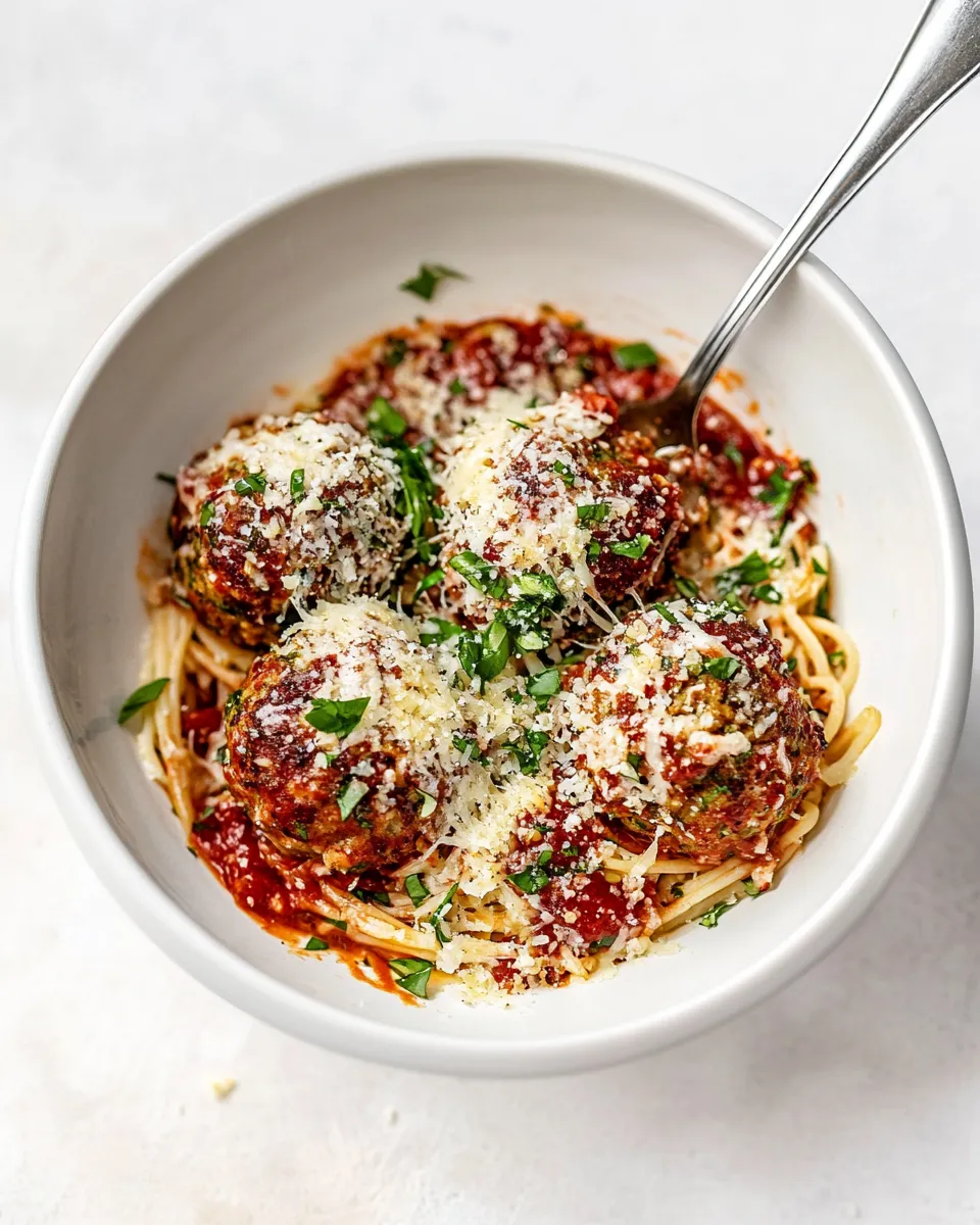 Easy Baked Chicken Parmesan Meatballs with Roasted Garlic Spaghetti. picture