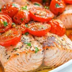 Delicious Baked Salmon with Roasted Tomatoes food shot