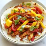 Delicious Easy Chicken Fajitas with Thai Mango Slaw and Coconut Rice recipe photo