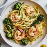 Homemade Garlic Sauce Bucatini with Roasted Shrimp and Broccoli. photo