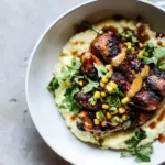 Homemade Honey BBQ Chicken and Charred Corn Polenta. food shot