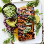 Delicious Honey Mustard Grilled Salmon with Avocado Basil Sauce. food shot