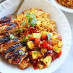 Homemade Jerk Chicken with Fired Rice and Grilled Pineapple Salsa. recipe photo