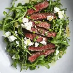 Homemade Marinated Flank Steak Salad with Feta and Arugula recipe photo