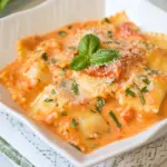 Homemade Ravioli with Creamy Sun-dried Tomato and Basil Sauce photo