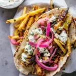 Homemade Roasted Chicken Gyros with Tzatziki and Feta Fries. recipe photo