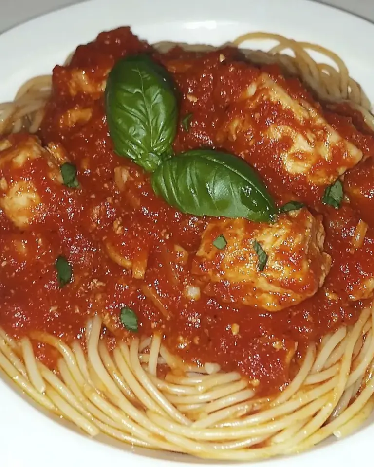 homemade Spaghetti Rigati with Chicken and Tomato Sauce photo