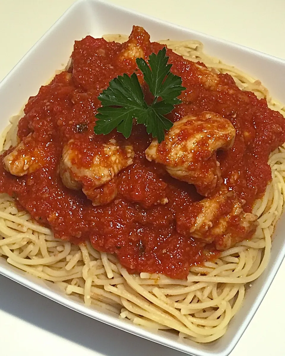 delicious Spaghetti Rigati with Chicken and Tomato Sauce shot