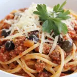 homemade Spaghetti with Italian Sausage and Olives photo