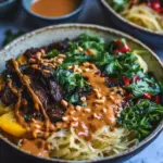 homemade Vietnamese Lemongrass Beef and Spaghetti Squash Noodle Bowls with Peanut Sauce. recipe photo