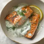 Homemade pan fried salmon with a lemony dill dressing recipe photo